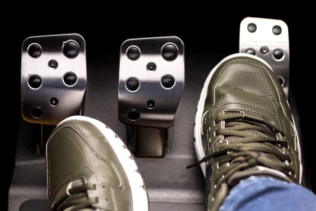 Driving with both feet: Is it legal?